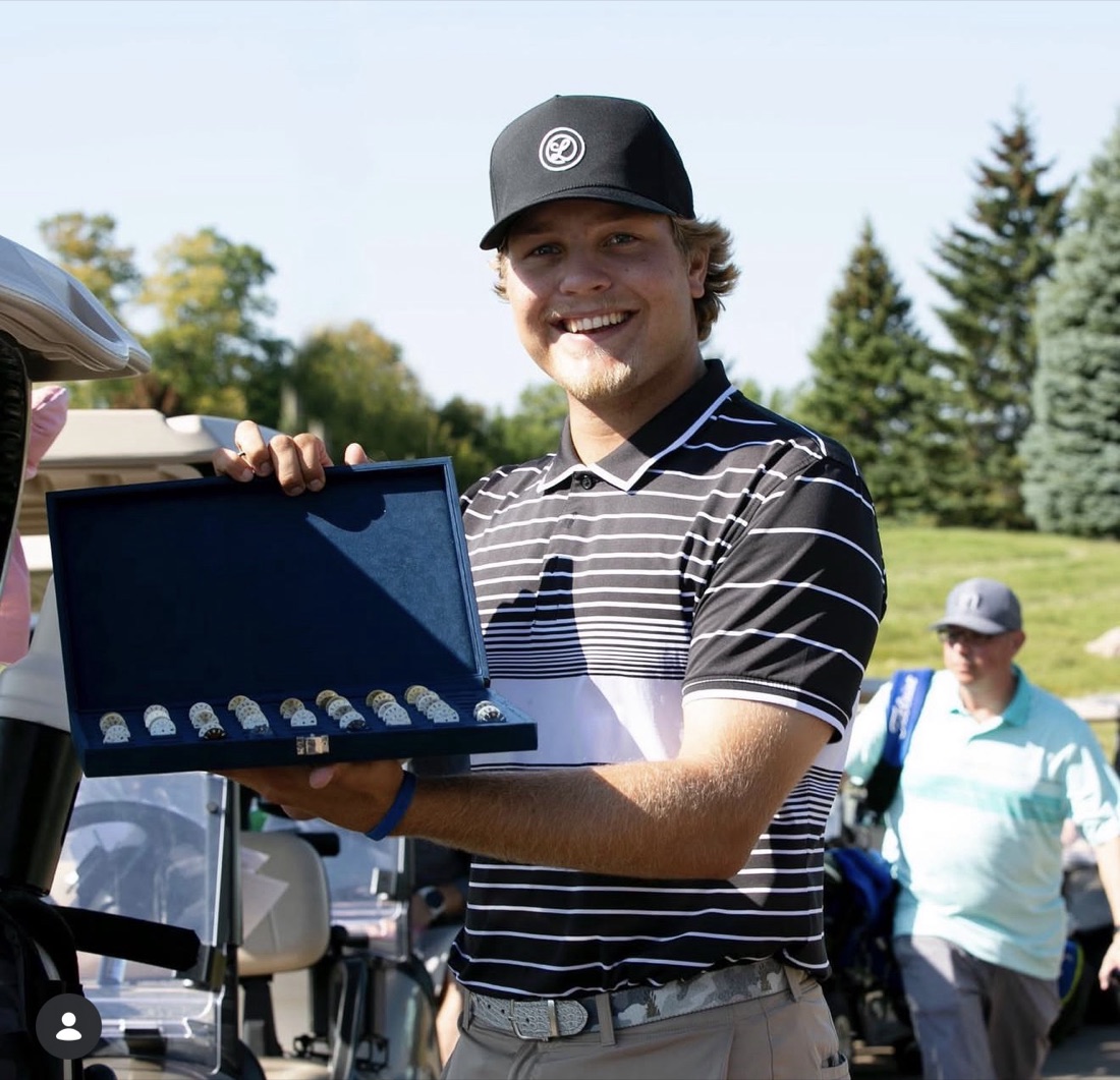 Nick Andersen — The Country C1ub member, founder of Luxury Ball Marks, holding a case of Swiss watch dial ball markers