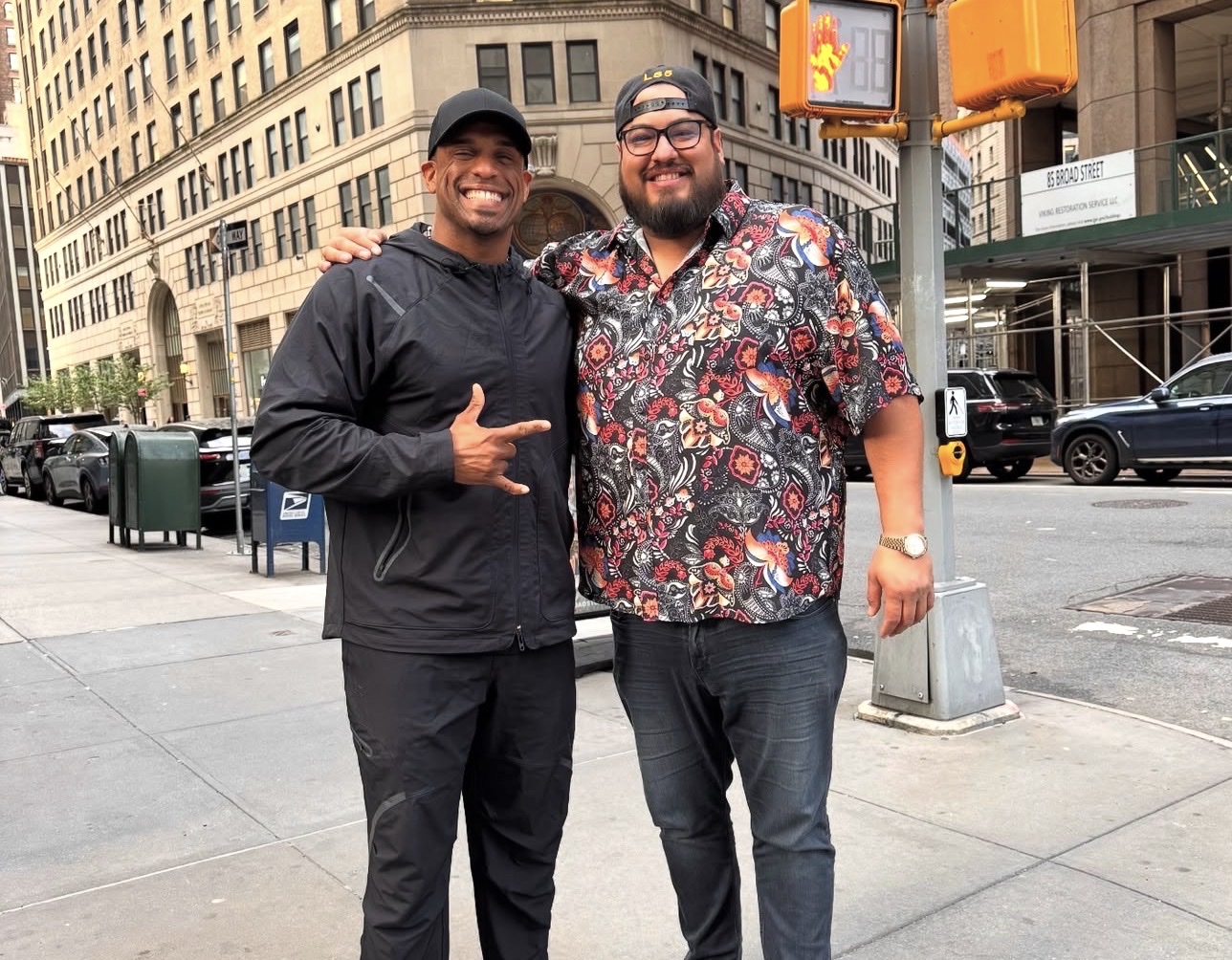 Piki with a friend on Broad Street, New York — a friend to everyone, wherever the work takes him
