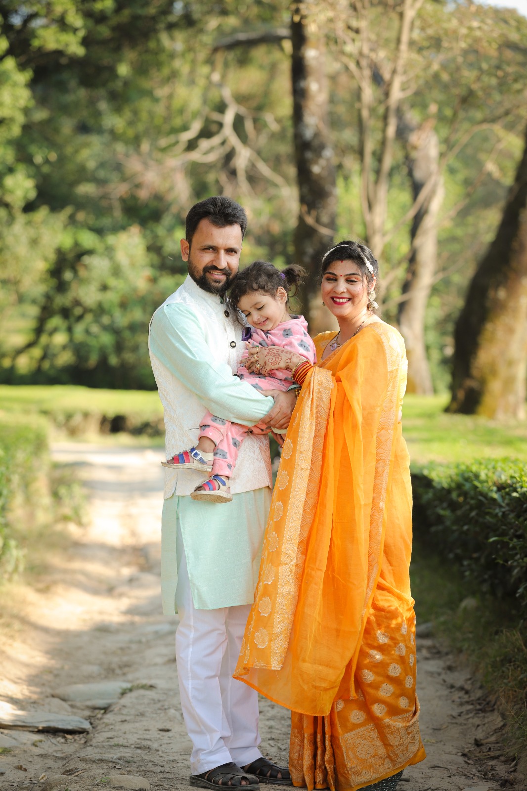 Rahul Dhiman with his wife and daughter in Himachal Pradesh
