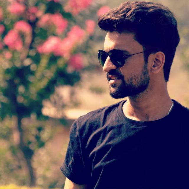 Rahul Dhiman, founder of Prowebcoder, in sunglasses outdoors in Himachal Pradesh