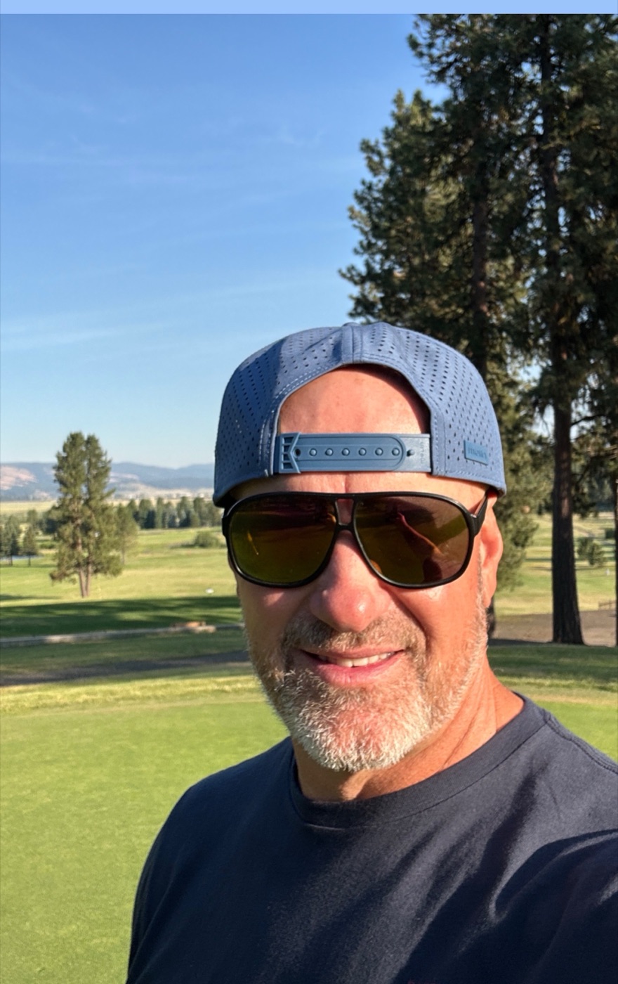 Trevor Murphy on an Idaho golf course — building a lake house by day, chasing scratch by evening