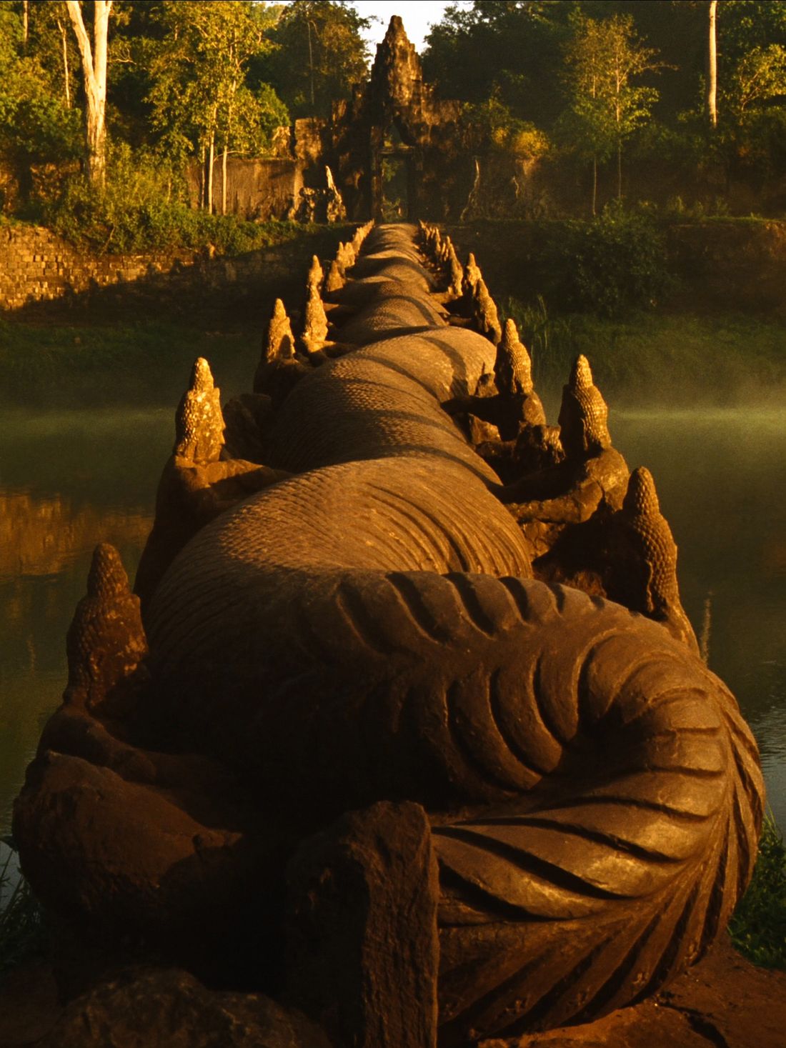 The great carved causeway crossing the moat toward the temple gate
