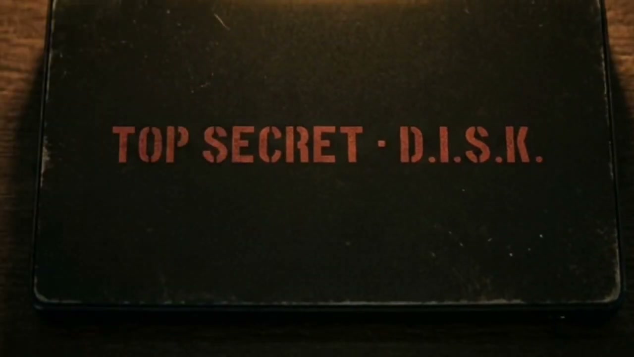 A black case stamped TOP SECRET, D.I.S.K.