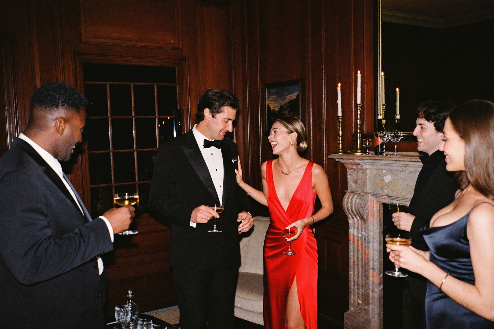 The long table in the Conversations, glasses raised