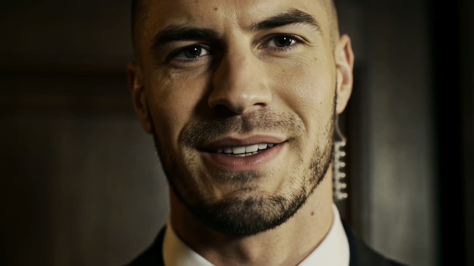 Dan — the keeper of the vault door, smiling with an earpiece in